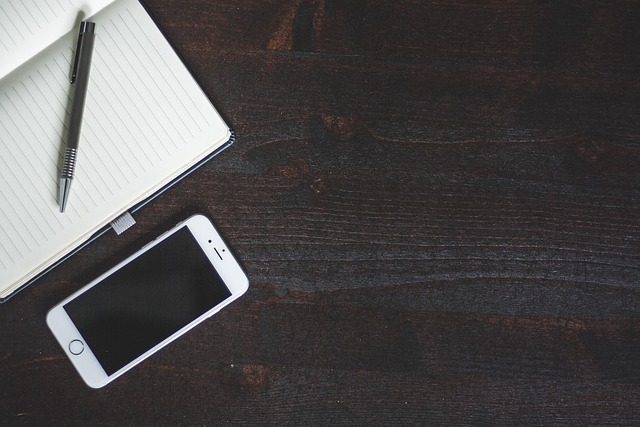 contact page for Canadian travel guides with notebook and phone