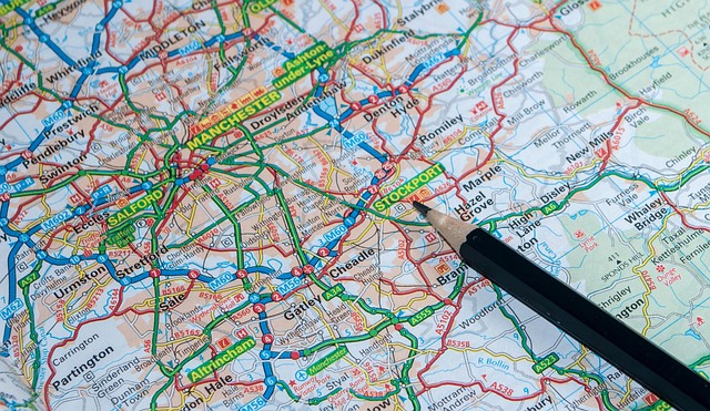 Canada travel guide book and map on desk for trip planning